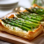 Asparagus puff pastry tart with flaky crust and fresh asparagus