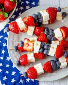 4th of July fruit kabobs with strawberries, blueberries, and banana pieces