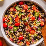 Cowboy Caviar Couscous Salad with black beans, corn, tomatoes, and couscous