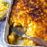 Cheesy baked corn casserole served as an easy BBQ side dish