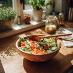 healthy summer salads with fresh vegetables in bowl on kitchen table