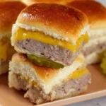 Turkey Burger Sliders with cheddar cheese and pickles on soft buns